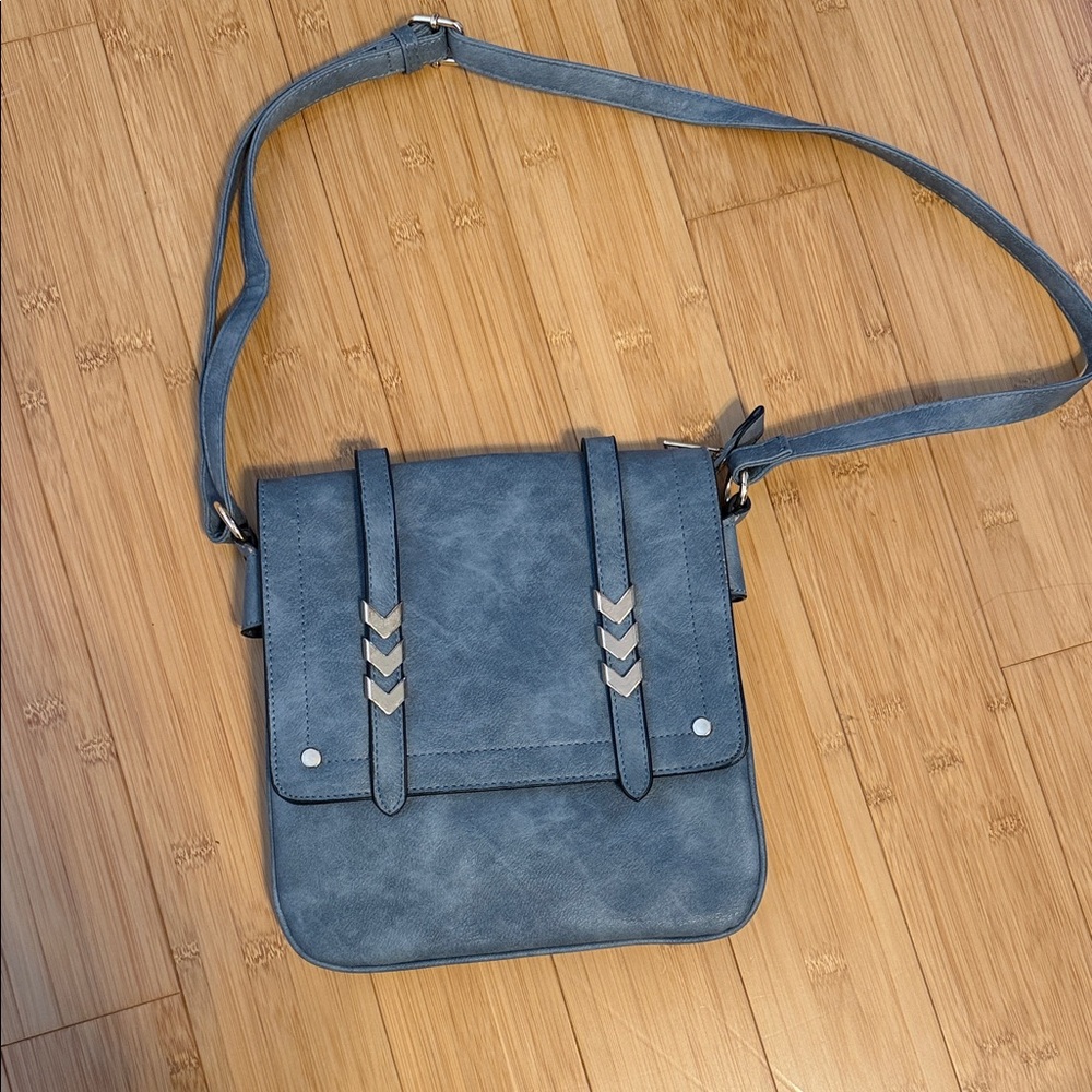 Stylish Blue Crossbody Bag with Chevron Details